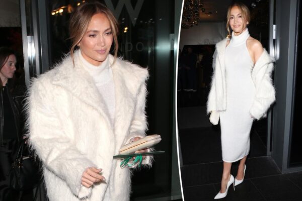 Jennifer Lopez se abriga con un vestido blanco de cuello alto en la proyección de ‘Unstoppable’ en Londres